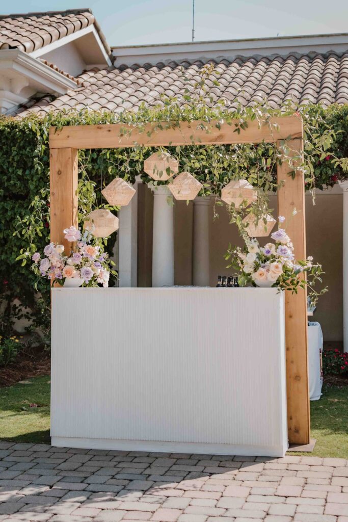 bar with hanging lanterns and flowers