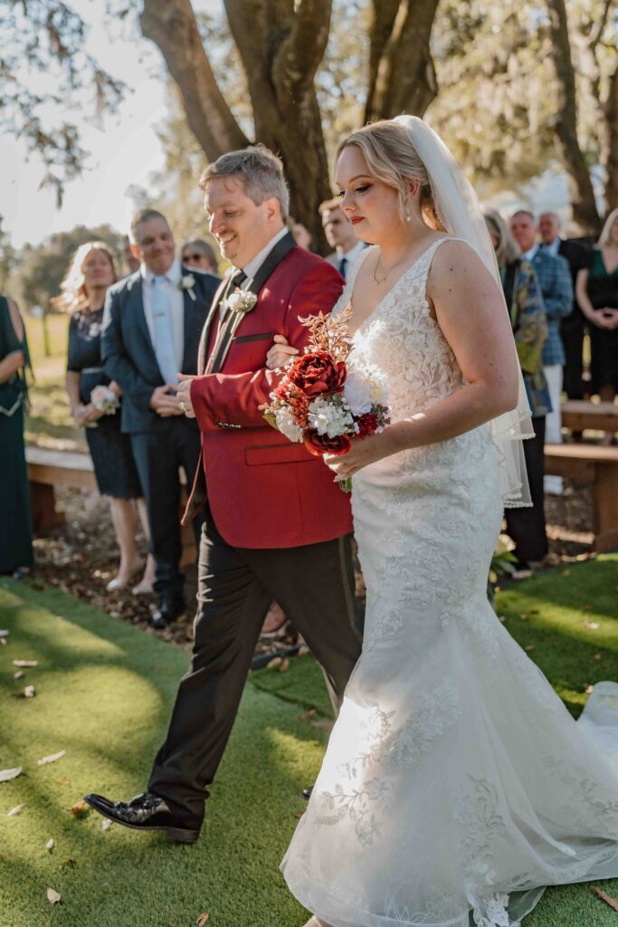 father walking a bride down the aisle