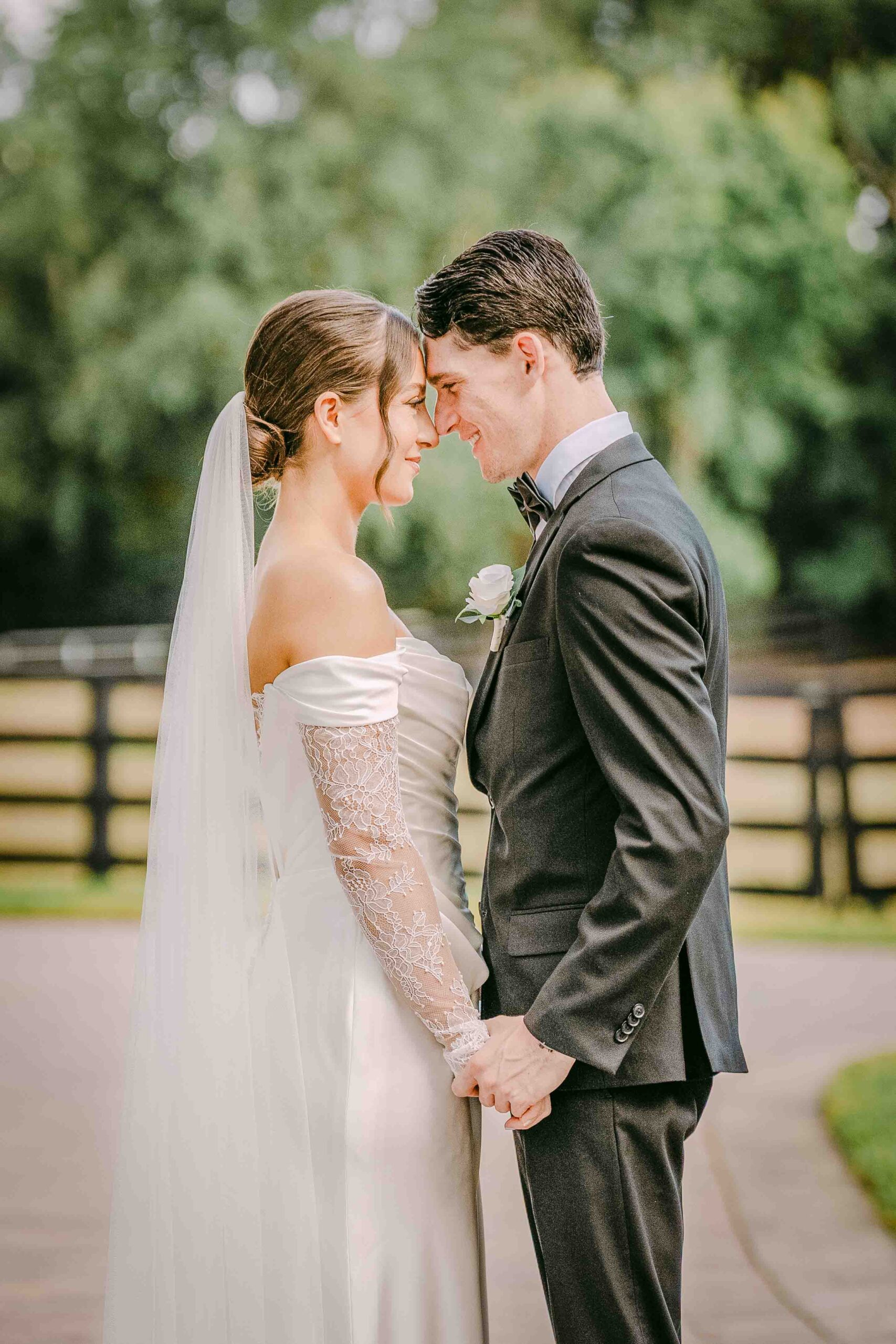 bride and groom looking at each other outside