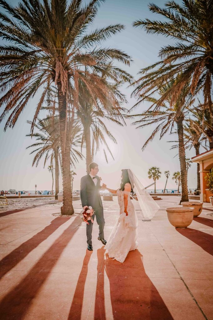 bride and groom dancing at sunset at clearwater beach florida