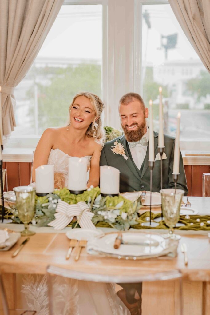 couple smiling during the wedding reception
