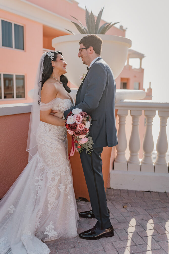 bride and groom looking at each other on the rooftop of the grand hyatt hotel