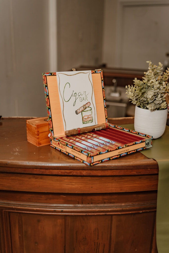 cigars in a box on top of the bar in the cigar lounge